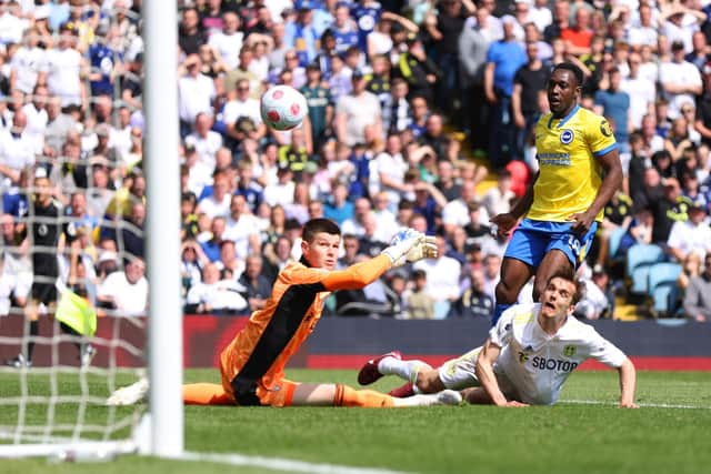 Danny Wellbeck chips Illan Meslier to give Brighton and Hove Albion the lead against Leeds United. Pic: George Wood.