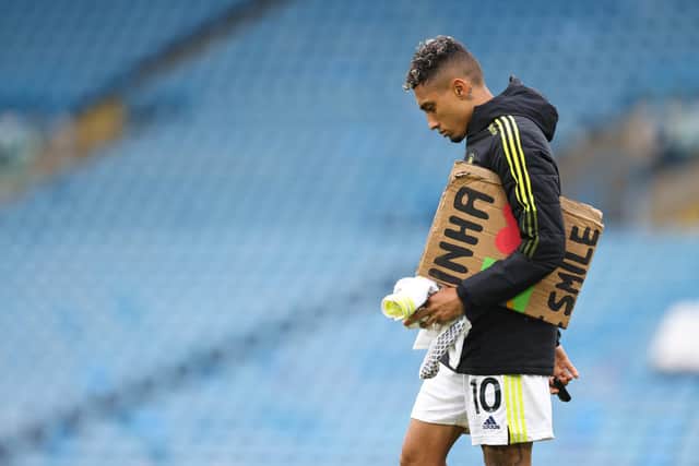 Raphinha departs the field of play long after the final whistle sealed a point for Leeds United against Brighton and Hove Albion. Pic: Robbie Jay Barratt.