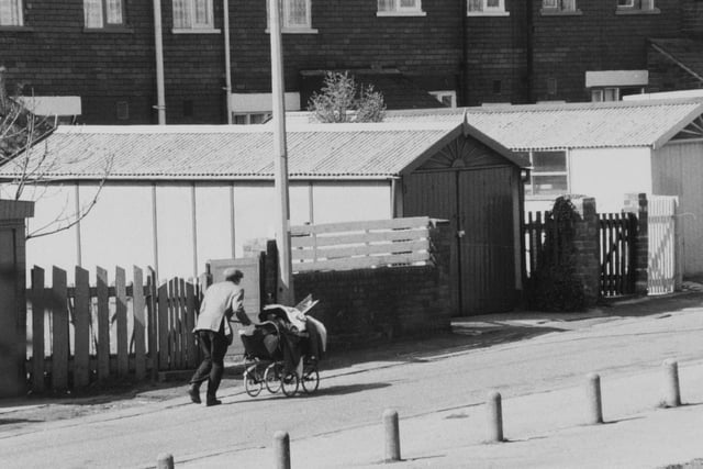A rag and bone man cuts a lonely figure on the streets of Chapeltown in 1980.