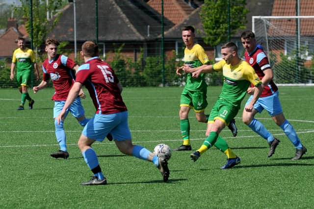 Middleton's
James Law threads a pass during Saturday's Yorkshire Amateur Supreme win over Littletown. Picture: Steve Riding.