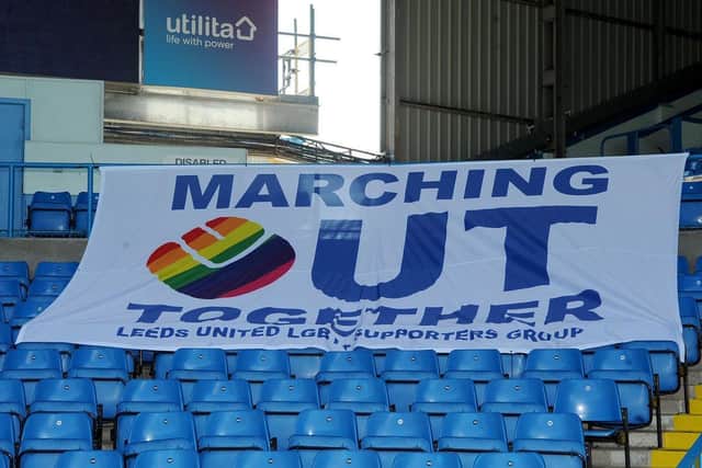 REPRESENT: Leeds United LGBT supporters group Marching Out Together display their flag beneath the scoreboard at Elland Road (Pic: Marching Out Together)