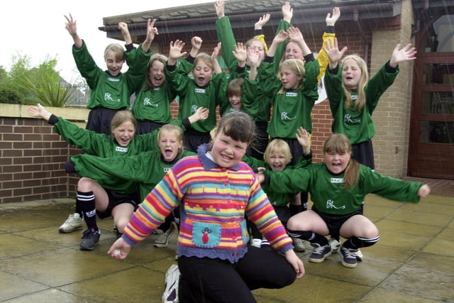 Laura Newsome celebrates after winning her school  - Wykebeck Primary -  a new sports kit after designing a flower bed for a Leeds in Bloom competition.