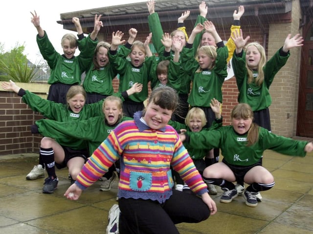 Laura Newsome celebrates after winning her school  - Wykebeck Primary -  a new sports kit after designing a flower bed for a Leeds in Bloom competition.