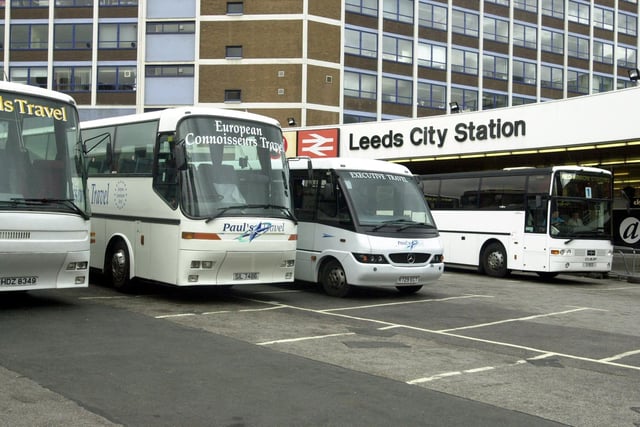 Buses on stand-by for train passengers after a power failure at Leeds City Station caused delays.