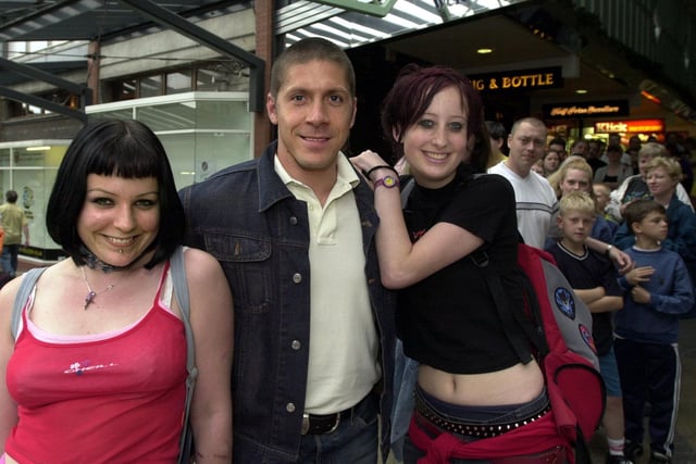 Meeting their idol. Leeds students Rosie Don(left) and Louise Elliott are pictured with film star Ray Park, who played Darth Maul =in the Star Wars fmovie Phantom Menace. He visited Comicville in the Merrion Centre raise funds for Action for Kids. The girls queued for over three hours to meet him.