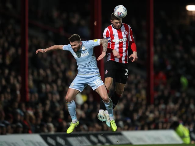 All rise Stuart Dallas challenges Brentford's Henrik Dalsgaard.