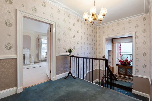A staircase leads to the first floor where four spacious bedrooms are located