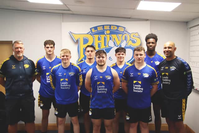 Pictured with John Bastian, left and Chev Walker, right are (back-row left to right) Ben Littlewood, Harrison Gilmore, Kyden Frater, Neil Tchamambe; Front-row Dylan Proud, Billy Davies, Blake Morgan. Picture by Leeds Rhinos.