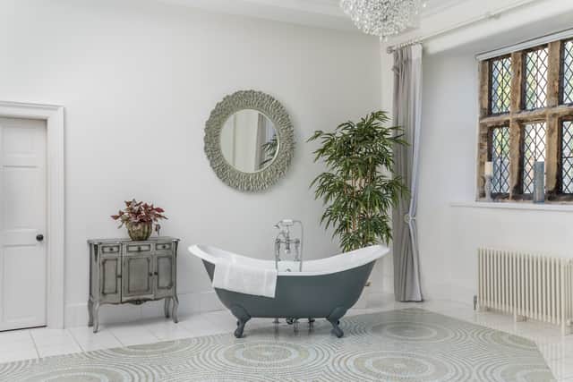 A stylish bathroom with Italian mosaics.