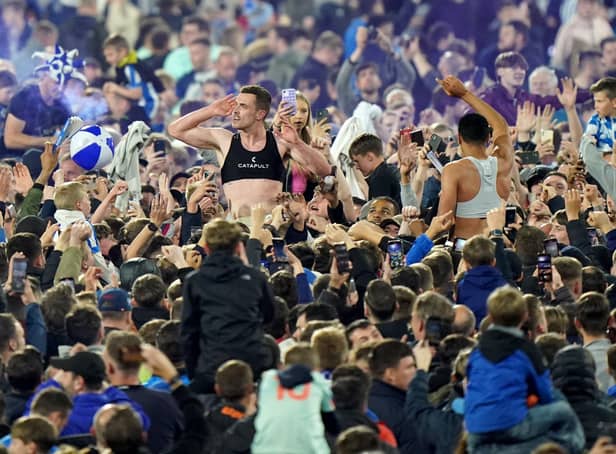 Huddersfield Town fans celebrate getting through to the play-off final. Picture: PA