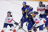 GB captain Jon Phillips, above left, said his team let themselves down with a poor first period against powerhouse Sweden. Picture: Dean Woolley/IHUK.