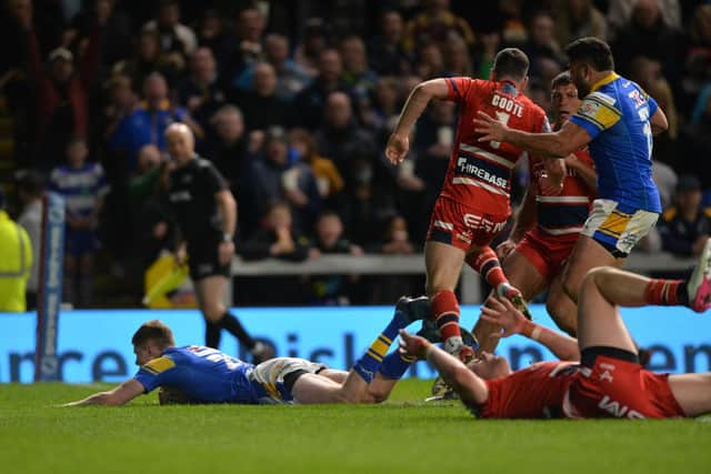 Morgan Gannon, pictured scoring for Rhinos against Hull KR, is available to face Wakefield after suspension. Picture by Bruce Rollinson.