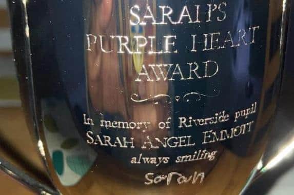 The Purple Heart Award set to be given out each year - engraved with Sarah's handwriting