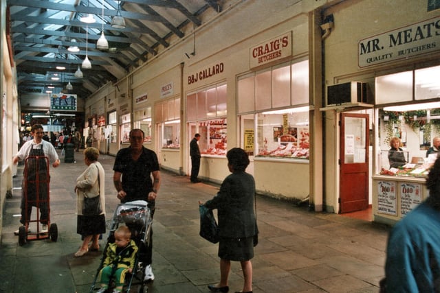 Some of the 20+ butchers shops contained within Kirkgate Markets 'Butchers Row'. Prices, B.& J. Ballards, Craigs and Mr. Meats shops are prominent in this photograph taken in October 1999.