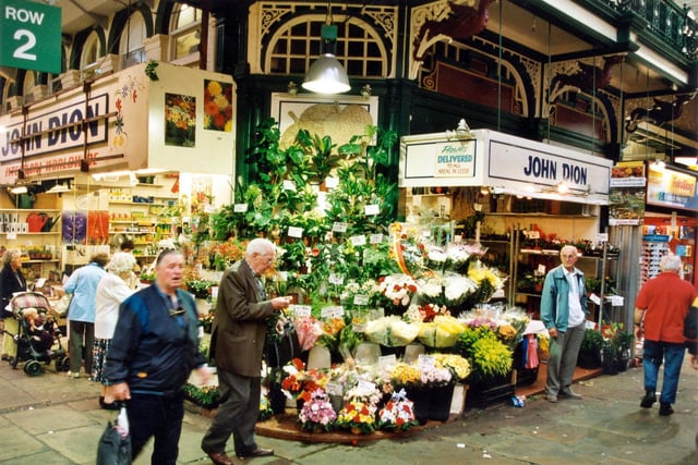 Row 2 of Kirkgate Market Hall with John Dion Florists on the corner pictured in September 1999.