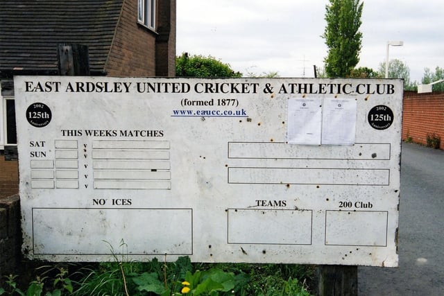 A metal sign displays information about East Ardsley United Cricket & Athletic Club on Bradford Road. The Cricket Club celebrated its 125th anniversary in 2002, having been established in 1877.