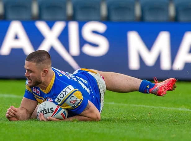 James Bentley scores the opening try for Rhinos against Wakefield. Picture by Bruce Rollinson.