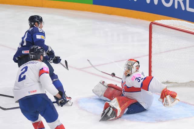 GB netminder Ben Bowns (right) denies Finland's Valtteri Fippula. Picture Dean Woolley/IHUK.