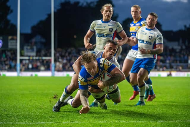 Blake Austin scores Rhinos' third try. Picture by Bruce Rollinson.