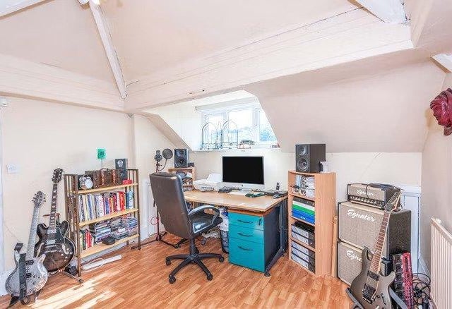 Despite being advertised as a bungalow, the property also features a spacious attic room - perfect for a home office space.