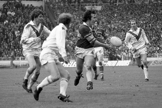 Les Dyl passes during Leeds' win over St Helens at Wembley in 1978. Picture by Steve Riding.