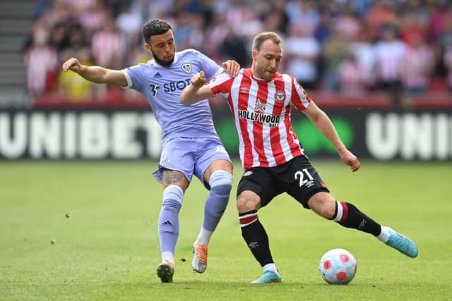 Christian Eriksen and Sam Greenwood vie for the ball. Pic: Alex Davidson