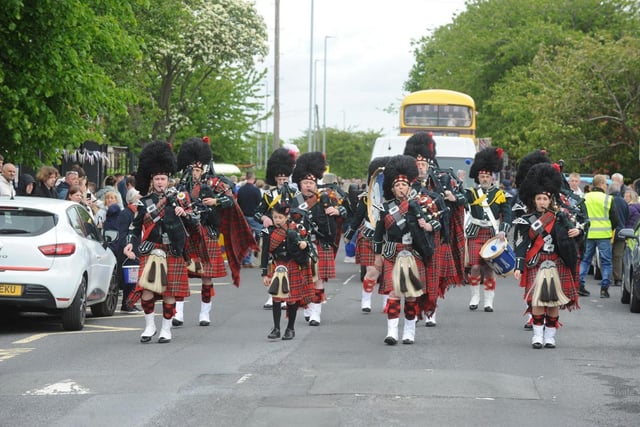 A group of traditional Scottish bagpipers also entertained the hundreds of attendees.