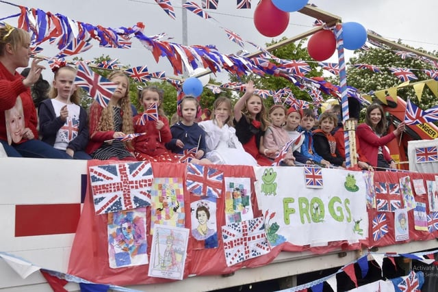 One decorated float was designed to honour Her Majesty The Queen who is celebrating her 70th year on the British throne.
