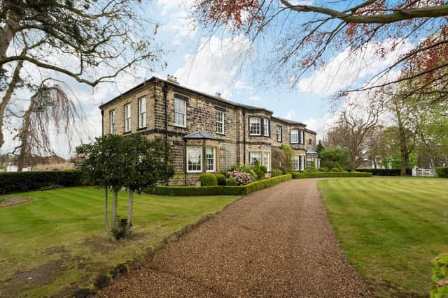 Electric sliding gates admit you to the property's extensive grounds and gardens, with a long driveway, parking spaces and garaging.