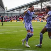 MATCH WINNERS - Raphinha and Jack Harrison scored the goals that sparked wild celebrations for Leeds United at Brentford. Pic: Tony Johnson