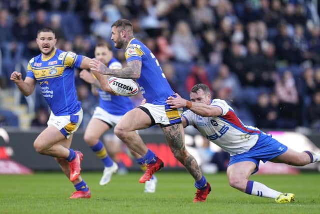 Zak Hardaker (right) and James Bentley (other than his yellow card) impressed Leeds Rhinos fans in the wi over Wakefield Trinity last time out. Picture: Danny Lawson/PA Wire.