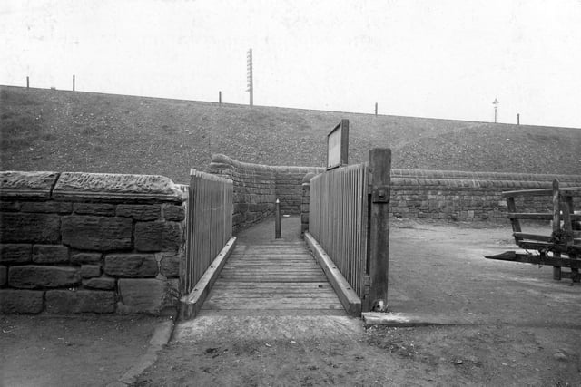 Water Lane in February 1939. A footbridge over Holbeck which leads to a walled footpath or ginnel, running along the railway embankment just the other side of the railway line, where although not visible would have been Holbeck Lodge, Matthew Murrays steam hall and across Water Lane, Midland Junction Forge.