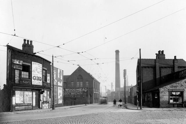 Looking along Great Wilson Street from Victoria Road in February 1937. 
Hurst and Woodhead, timber merchants can be seen on the left. The chimney of Borough Mills (Longley mattress manufacturers) can be seen on the right.