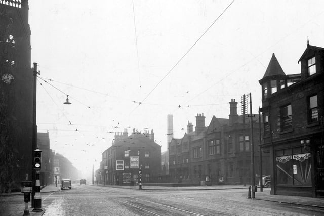 Meadow Lane at the junctions with Great Wilson Street in February 1937. The clock tower of Christ Church can be seen.