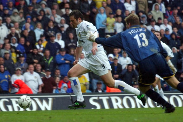 Mark Viduka makes sure of the three points by rounding Aston Villa goalkeeper Stefan Postma to score in added time.