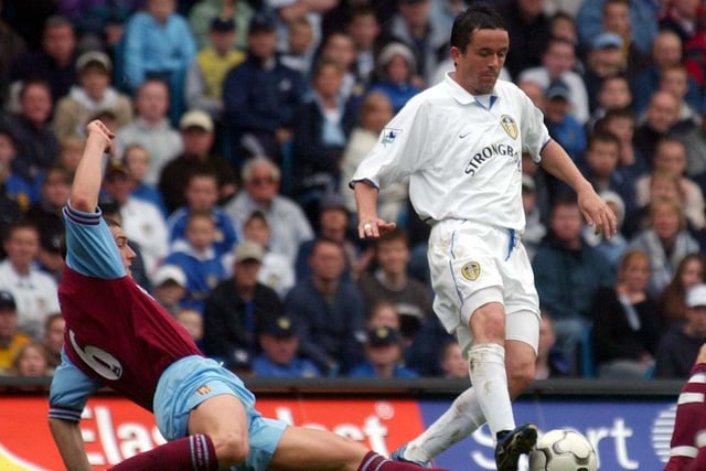 Gary Kelly is challenged by Aston Villa's Gareth Barry.