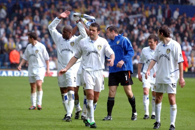 The Leeds United players thank the fans at the end of the game.