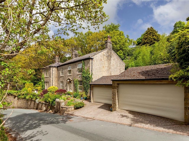 An alternative view of the Todmorden home frontage, with garages in the foreground.