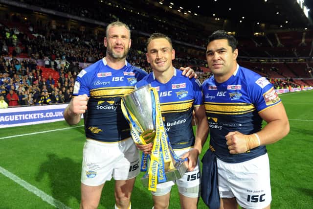 Jamie Peacock, left, with fellow Rhinos greats Kevin Sinfield and Kylie Leuluai, who also bowed out after the 2015 title win. Picture by Steve Riding.