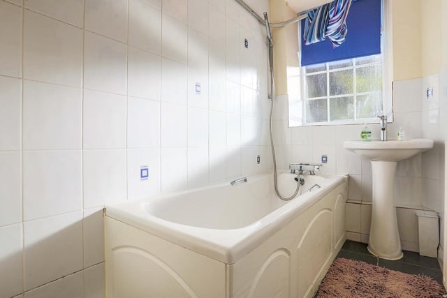 The bathroom is on the ground floor with a modern suite and there is a separate toilet.
