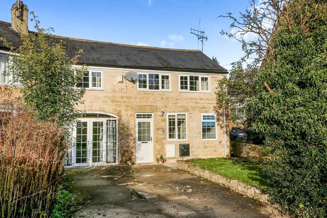 This lovely stone-built period cottage on the outskirts of Leeds is on the market for £275,000.