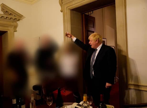 A handout photo dated November 13, 2020 issued by the Cabinet Office showing Prime Minister Boris Johnson at a gathering in 10 Downing Street for the departure of a special adviser, which has been released with the publication of Sue's Gray report into Downing Street parties in Whitehall during the coronavirus lockdown. PIC: Sue Gray Report/Cabinet Office/PA Wire