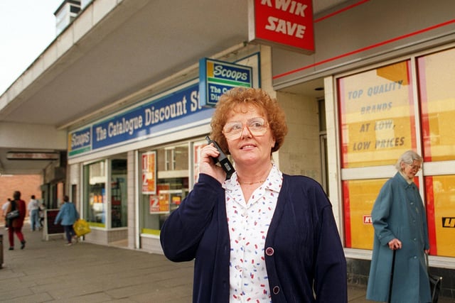 This is Margaret Shaw, manageress of Scoops, pictured in February 1998. She was using the radio to warn other members of the West Leeds Shop Link scheme of potential shoplifters on Town Street.