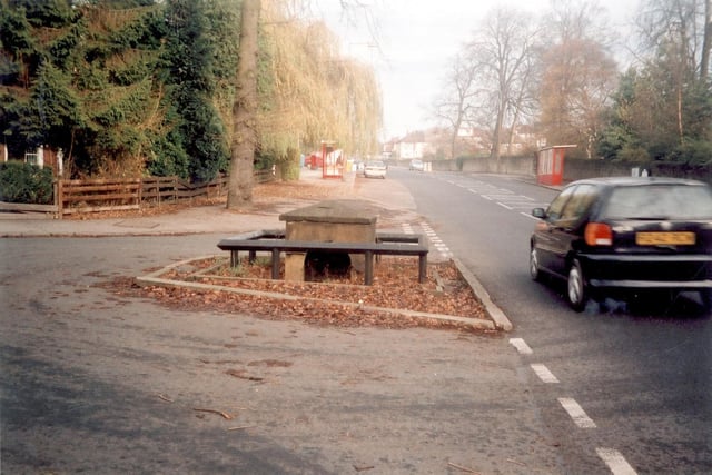 The Revolution Well on Parkland Crescent at the junction with Stonegate Road in November 2003.