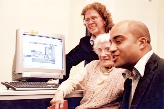 Minnie Dean, a 100 year old resident of Hunslet, browses the Leodis website in December 2003. She is pictured with Coun Judith Blake and Coun Adam Ogilvie.