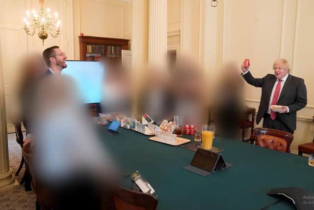 The report included a series of photos, with Mr Johnson pictured at the surprise birthday party in the Cabinet Room on June 19, 2020. Picture: Sue Gray Report/Cabinet Office/PA Wire.