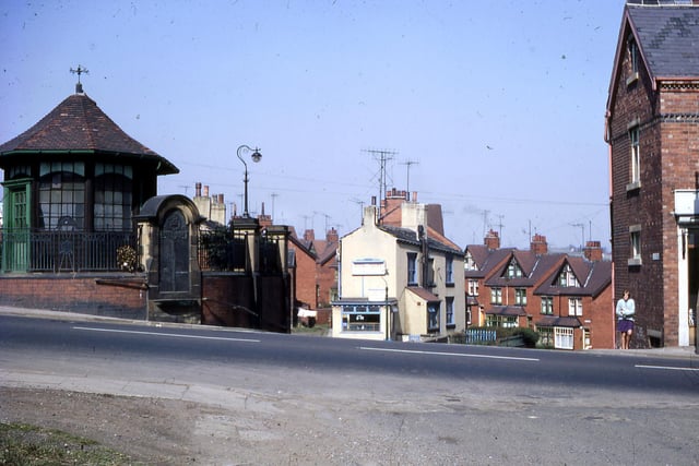 Elland Road, foreground at the junction with Old Road, background, showing the War Memorial on the corner. The photograph was taken from Little Lane in April 1968.