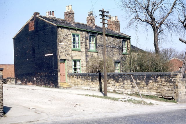 Chapel Houses located at the corner with Crossland Road pictured in April 1968. The building dates from the early 19th century and was originally Daffil Chapel. Afer 1850 the chapel was vacated when the congregation moved to the Zion Independent Chapel in Morley.