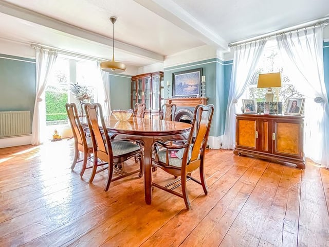 The sizeable, beamed dining room benefits from double aspect windows