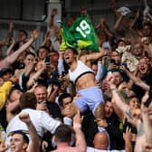 CELEBRATE: Raphinha leads the celebrations as Leeds United secure Premier League survival (Photo by Alex Davidson/Getty Images)
